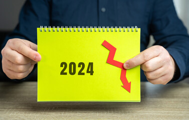 2024 and down arrow. Economic crisis and recession. Bankruptcy, finance crisis and forecasting....