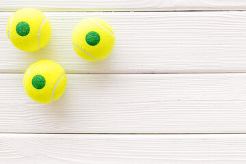 Set of green tennis balls, top view. Sport games background - 791469954