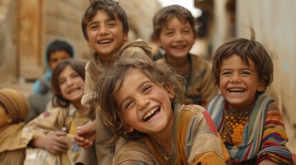 A group of joyful children are laughing and enjoying each other's company in an outdoor environment, showcasing the innocence of childhood.
