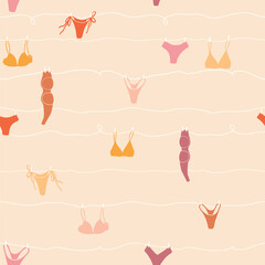 Cute seamless pattern with underwear hanging on a string. Swimsuit, bikini, panties, bra in summer day. Summer time vacation and travel aesthetic. Groovy and fun vector tropical background