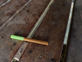 a forte cigarette on a wooden table