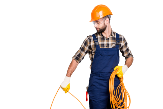 Half face portrait of busy stylish electrician with stubble in overall, shirt, hardhat installing, laying a cable, having rolled wire in hand, standing over grey background - Powered by Adobe