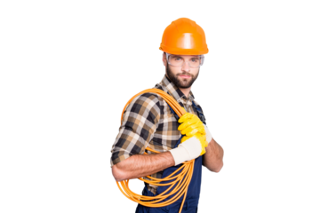 Portrait of trendy virile electrician in hardhat, overall, shirt is ready for work, having, holding rolled cable on shoulder, looking at camera, isolated on grey background
