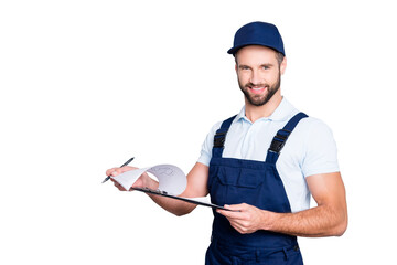 Portrait with copyspace, empty place of positive confident deliver in blue uniform having clipboard with papers in hands looking at camera isolated on grey background