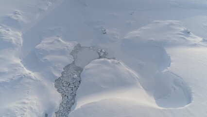 Antarctica Coast Glacier Surface Open Water Aerial View. Arctic Lagoon Floating Melting Ice Majestic Landscape Global Warming Concept Top Flight Drone