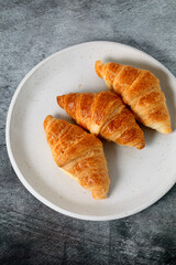 Plate with delicious mini croissants