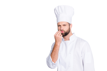Portrait with copy space, empty place for advertisement product of handsome chef cook in beret, white outfit making bellisimo symbol, sign with pout lips and fingers, isolated on grey background