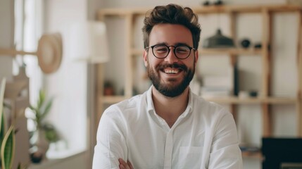 A man with glasses is smiling and posing for a picture - Powered by Adobe