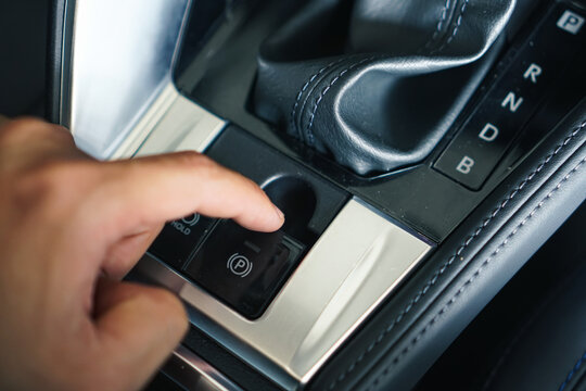 Fingger push/pull the Electric electronic Parking Brake with on modern vehicle