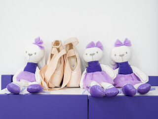 Ballerina gracefully poised at the ballet barre in a sunlit studio, practicing her pirouettes and perfecting her form amidst the serene ambiance of the dance sanctuary © Alena