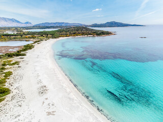 Aerial view of white sand and turquoise water in Sardinia