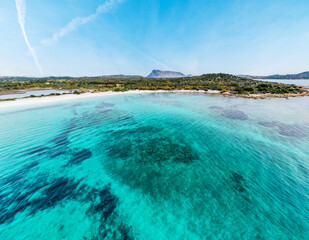 Aerial view of turquoise water by the shore in Sardinia