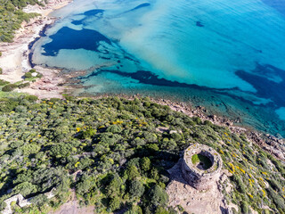 Aerial view of a sighting tower by the sea in Porto Ferro shore