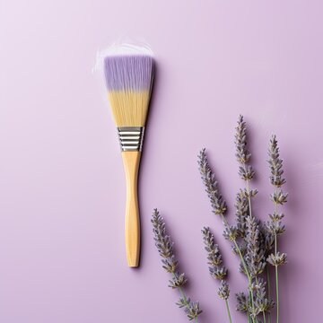 Paintbrush on an empty lavender background, with copy space for photo text or product, blank empty copyspace
