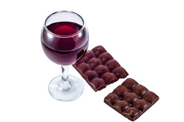 
A glass of red wine and a chocolate bar on a white background.