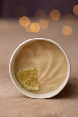 Craft natural ice cream in a paper bucket, the taste of lime sorbet