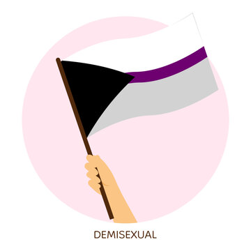 Hand holding demisexual pride flag