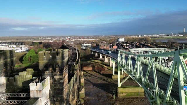 Drone shot of Silver Jubilee Bridge and Ethelfleda Bridge in Runcorn, Halton, England, UK