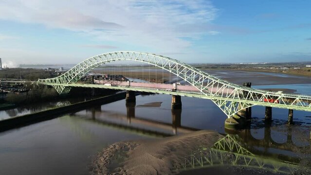 Drone shot of Silver Jubilee Bridge in Runcorn town, Halton, England, UK