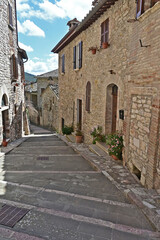 Fototapeta na wymiar Corciano, vicoli, strade, case del vecchio borgo - Perugia, Umbria 