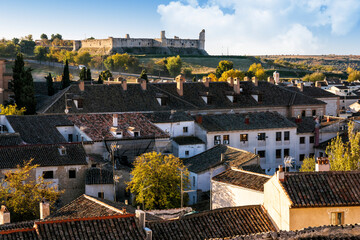 Ruins of the castle over the roofs in Chinchon. Madrid. Spain. Europe.