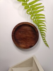 photo of wooden plate on table