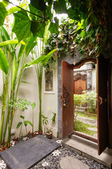 Beautiful green tropical garden outdoor veranda with ecological plants surrounded nature in Asia