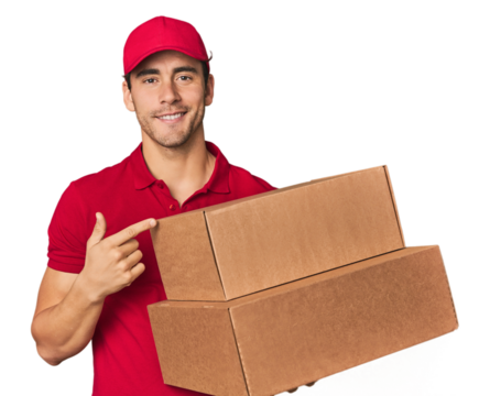 Young Hispanic delivery man with boxes person pointing by hand to a shirt copy space, proud and confident
