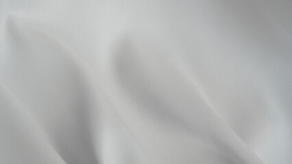 .Smooth white fabric background, minimalist elegance for product presentation