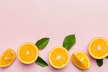 fresh Fruit orange slices on colored background. Top view. Copy Space. creative summer concept....
