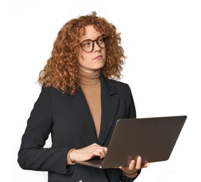 Young Caucasian redhead businesswoman with laptop happy