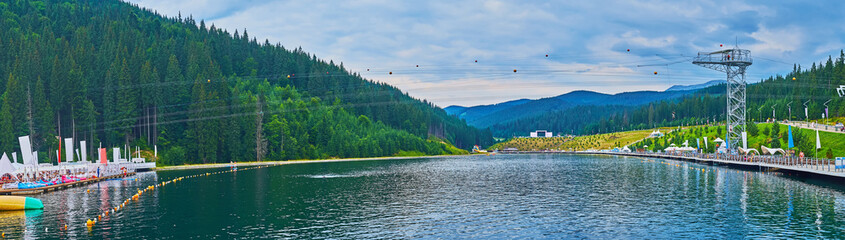 Panorama of the Molodist Lake in the evening, Bukovel, Carpathians, Ukraine - obrazy, fototapety, plakaty