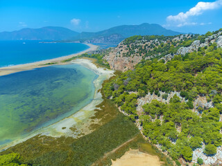 Beautiful, delightful landscape from a drone to Iztuz Beach on a sunny day, Dalyan, Turkey. Next to...