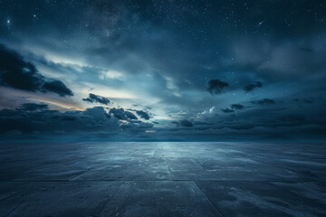 Dark Concrete Floor Background with Scenic Night Sky Horizon and Dramatic Clouds.