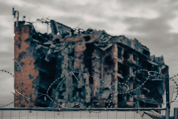 barbed wire fence against the sky war in Ukraine