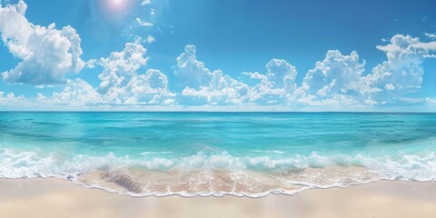 Panoramic view of the pristine beach with cliffs, clear blue sky and gentle waves on a sunny day