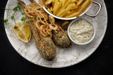 Deep Fried goby fish with fried potatoes