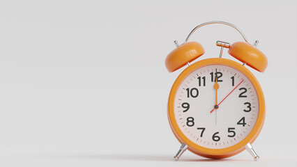 Yellow alarm clock on white background. The clock hand shows 12 o'clock