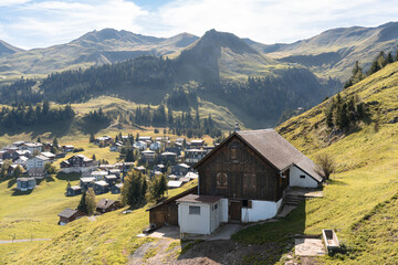 Aerial view of mountain huts in Stoos village in Switzerland. Swiss Alps ski resort in autumn or fall