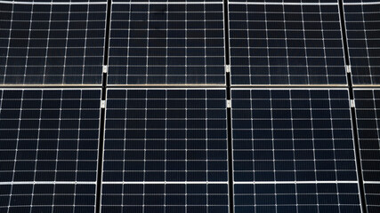 Aerial closeup of a solar panel. Solar cells store energy from the sun. Green energy concept.