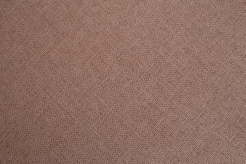Close up of brown clean canvas, seamless pattern fabric texture close up, template backdrop