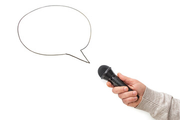 Male arm holding a black microphone next to a speech bubble, isolated on white background,...