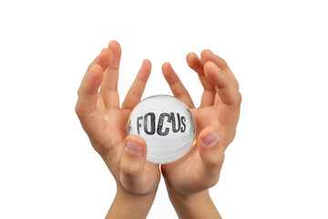 Child hands holding a glass sphere isolated on white background, with focus word distorted,...