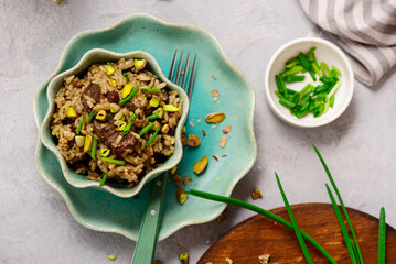 Turkish pilaf with chicken liver and pistachios - 791615716