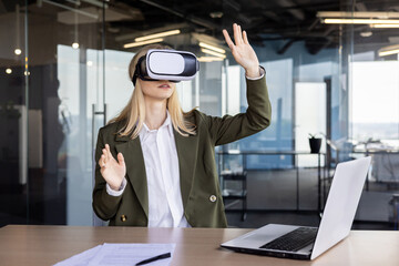 Businesswoman exploring virtual reality in modern office