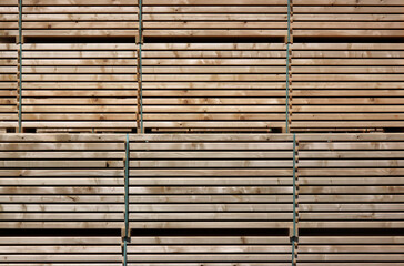 Abstract stripe texture of stacked sanded timber boards