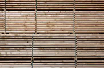 Abstract stripe texture of stacked sanded timber boards