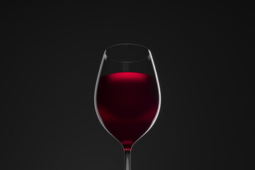 Close-up of red wine in a glass against dark background