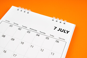 July 2024 month calendar on orange color cover background.