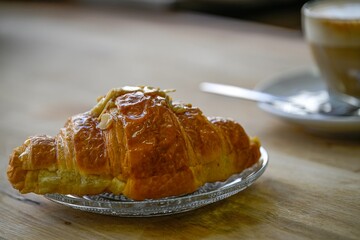 Isolated high resolution close of a fresh and delicious single croissant